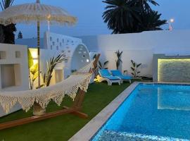 Villa Papaya - Djerba, khách sạn ở Mezraya