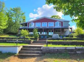 Maison du lac avec plage, embarcations, billard et spa privé