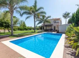 Casa junto al mar con jardín