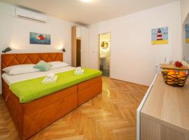 Apartment & Double Room Stanka, hostal o pensión en Baška