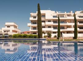 Apartamento con jardín y piscina en Jardines de Montesolana, khách sạn ở Los Dolses