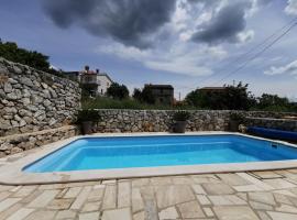 Apartment Andrea with pool and seaview, Hotel in Kornić