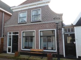 B&B Bureau Warmoesstraat, bed & breakfast σε Den Burg