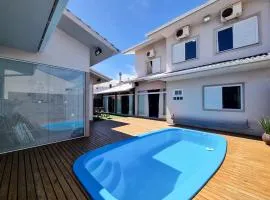 Casa com piscina na Praia do Sonho