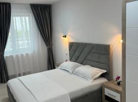 Luxury Sunny Apartments near City Center Suceava, acomoda&ccedil;&atilde;o com cozinha em Suceava