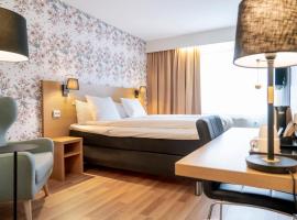 First Hotel Dragonen: Umeå şehrinde bir otel