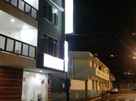 Hostal Palmar en Baños de Agua Santa, מלון בבאניוס
