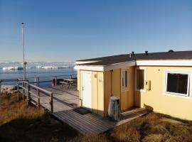 Grand seaview vacation house, Ilulissat，伊盧利薩特的小屋