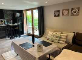 Les Saisies - La petite Vardache - studio alcôve 27 m2 - 1 lit 140 - parking - local vélo, hotel en Hauteluce