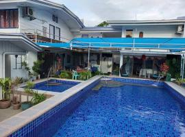 CozyVilla at Villa Astudillo Pansol Private Hotspring Resort, hotell i Calamba