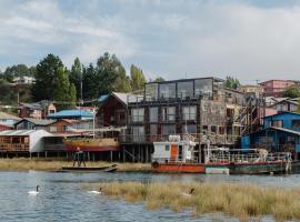 Palafito 1326 Hotel Boutique Chiloé, מלון בקסטרו