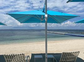 Condo with Private Beach at Tambuli Seaside Beach Resort, aparthotel a Lapu Lapu City