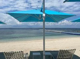 Condo with Private Beach at Tambuli Beach Resort near Airport in Cebu
