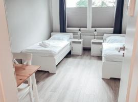 Zweibettzimmer "Grau" in zentraler Lage, hostel Brémában