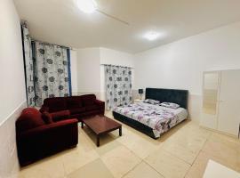 Lux Living Room, Hotel in Adschman