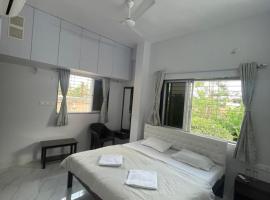 White Haven Homestay, δωμάτιο σε οικογενειακή κατοικία σε Alibag