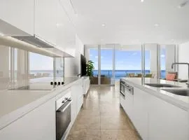 Beachside Luxury Penthouse with Breathtaking Views and Private Rooftop Terrace