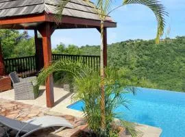 Bungalow d'une chambre avec vue sur la mer piscine partagee et terrasse a Marigot Vieux Habitants a 6 km de la plage