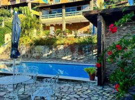Casa Cantinho da Paz, seu lazer completo, churrasqueira, piscina e muita tranquilidade，格雷夫森德的飯店