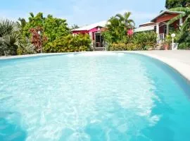 Maison de 2 chambres avec piscine partagee jardin clos et wifi a Petit Canal