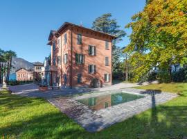 GuestHost - Lakeview Apt with Pool, Garden & Parking, hotel en Lierna