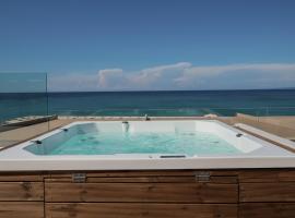 Kavo Seaside Luxury Apartment, pezsgőf&uuml;rdővel rendelkező sz&aacute;lloda Arg&aacute;sziban