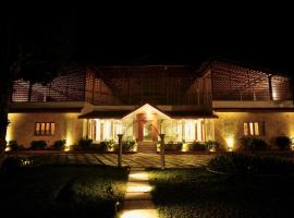 The Windchimes Retreat Coorg, hotell sihtkohas Virajpet