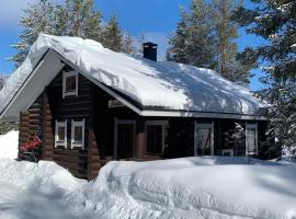 Ruska 2, Ylläs - Log Cabin with Lake and Fell Scenery, hotell i Äkäslompolo