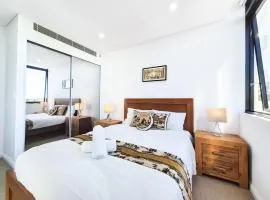 Relaxing 1BR w Pools & SPA, Gym in Olympic Park