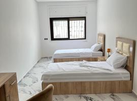 Chambre &agrave; Agdal Rabat dans un appartement partag&eacute; -two single beds-, hotel con tinas de hidromasaje en Rabat