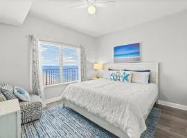 Modern Beachfront Condo on the Beach Sleeps 6! by Dolce Vita Getaways PCB
