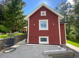 Charming apartment in a red house in Stockholm、ストックホルムのバケーションレンタル