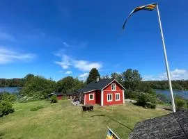 Majas Backe on a island with boat