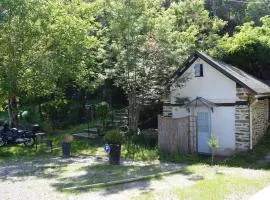 Chalet climatisé en bordure de rivière mansardée