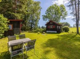Koselig hytte på eget tun med varmtvanns utedusj
