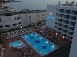 Ada Newday Resort Hotel, מלון בקושדסי
