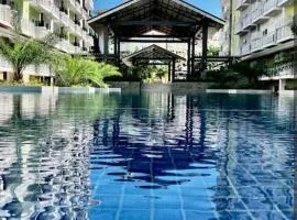 212B Amani Grand Resort Residences near to Airport with pool, gym, wifi, netflix
