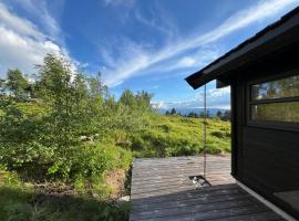 Sveheim - cabin with an amazing view ชาเลต์ในฟลอ