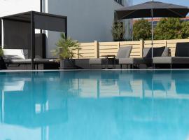 Kracher Hotel Doppelzimmer - für maximal 4 Personen inklusive Pool, hotel v destinácii Illmitz