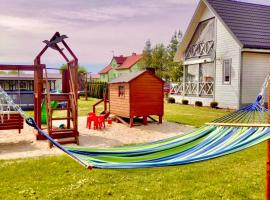 Domki w Rusinowie u Gosi, hotel en Jarosławiec