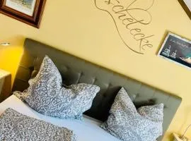 FeWo 58 - Appartement im Rottalblick - Helle Kuschelecke genießen mit Bademantelgang zur Therme, TV und Stellplatz im Haus