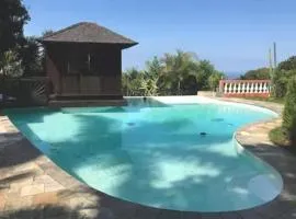 Bungalow charmant avec jardin à Saint-Louis, piscine partagée