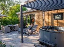 Wellnesslodge Scholekster met jacuzzi en uitzicht
