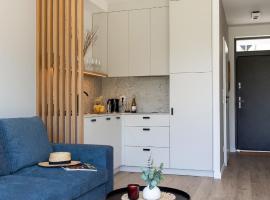 Nadmorska Otulina - Nowoczesne dwupoziomowe domki nad morzem z dużym ogrodem, hotel a Ustka