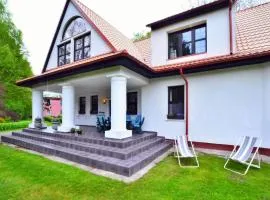Comfortable holiday villa with fireplace, garden