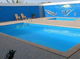 Resid&ecirc;ncia &Aacute;guia, cottage a Praia