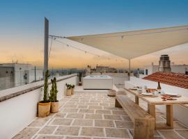 Casa u Bùrie, casa design con terrazza panoramica e jacuzzi, ξενοδοχείο σε Cisternino