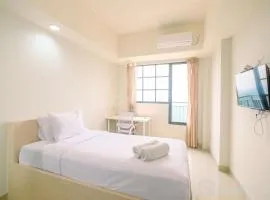Simply Look Studio at Evenciio Margonda Apartment By Travelio