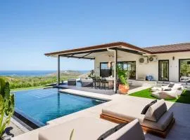Luxe Tropical Villa with Sparkling Infinity Pool, Panoramic Ocean Views & Community Amenities