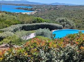 Supreme Beach Location with pool at Cala Sassari, villa in Marinella